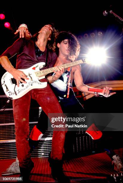 Warren DeMartini and Stephen Pearcy of RATT performs on stage at the Rosemont Horizon in Rosemont, Illinois, September 21, 1985.