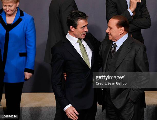 Secretary General Anders Fogh Rasmussen and Italian Prime Minister Silvio Berlusconi attend the official family photo of the NATO Summit 2010 at...