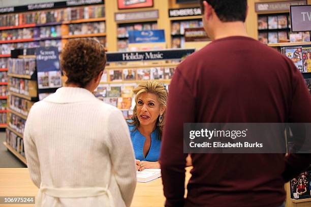 Hoda Kotb signs copies of her book "Hoda: How I Survived War Zones, Bad Hair, Cancer, and Kathie Lee" at Barnes & Noble on November 19, 2010 in Palm...