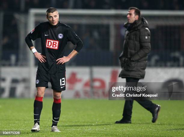 Nikita Rukavytsya of Berlin and head coach Markus Babbel look dejected after the Second Bundesliga match between VfL Osnabrueck and Karlsruher SC at...
