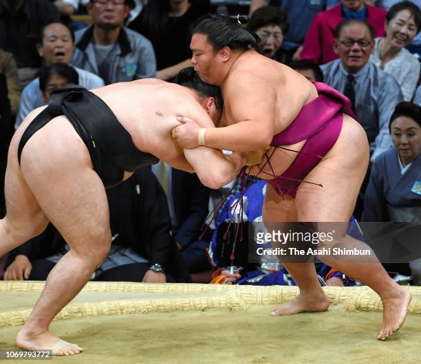 Ozeki Takayasu and Yoshikaze compete on day nine of the Grand Sumo Kyushu Tournament at Fukuoka Convention Center on November 19, 2018 in Fukuoka,...