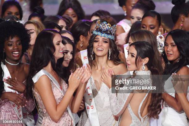 Miss Mexico Vanessa Ponce de Leon celebrates with fellow contestants after she was crowned the winner of the 68th Miss World final in Sanya, on the...