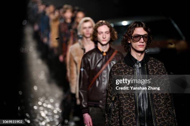 Model walks the runway during COACH 2019 early autumn collection fashion show on December 8, 2018 in Shanghai, China.