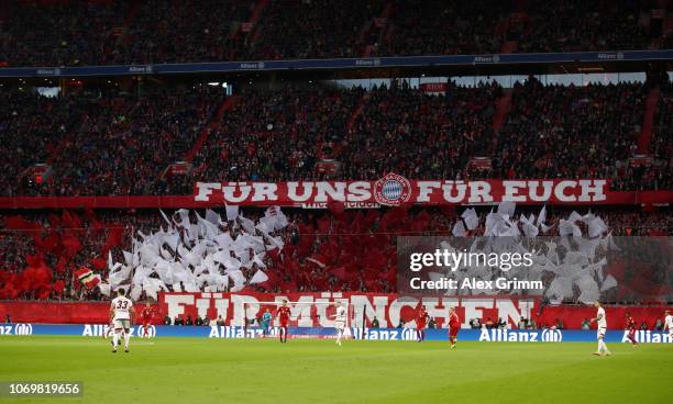 Fans display a banner during the Bundesliga match between FC Bayern Muenchen and 1. FC Nuernberg at Allianz Arena on December 8, 2018 in Munich,...