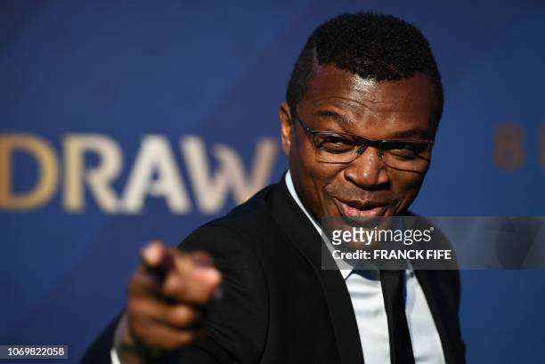 Former French player Marcel Desailly poses upon his arrival at the final draw of the 2019 FIFA Women World cup football tournament in...