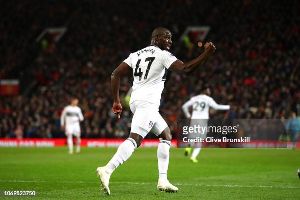 Aboubakar Kamara of Fulham celebrates after scoring his team's first goal during the Premier League match between Manchester United and Fulham FC at...