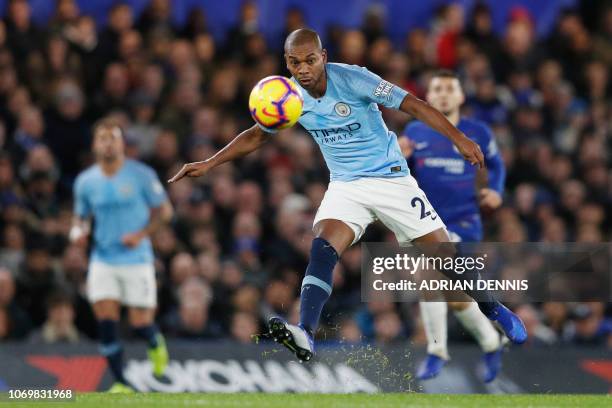 Manchester City's Brazilian midfielder Fernandinho watches the ball during the English Premier League football match between Chelsea and Manchester...