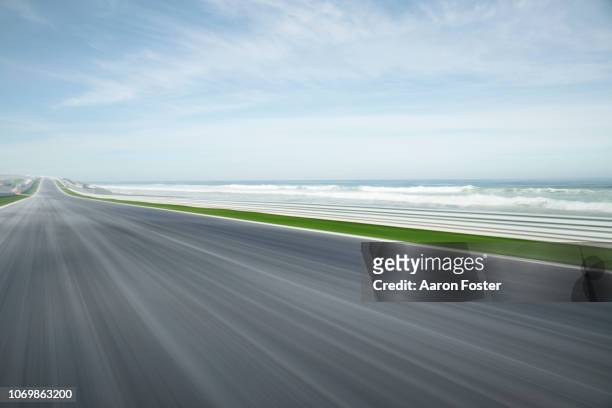 empty country road in motion - road motion stock pictures, royalty-free photos & images