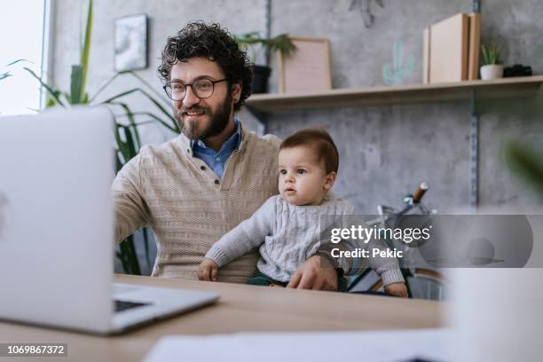 family having video call with their loved ones - innocence stock pictures, royalty-free photos & images