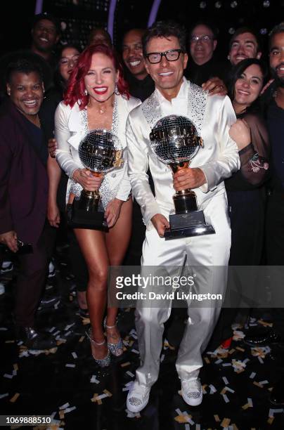 Mirrorball trophy winners Sharna Burgess and Bobby Bones pose at "Dancing with the Stars" Season 27 Finale at CBS Television City on November 19,...