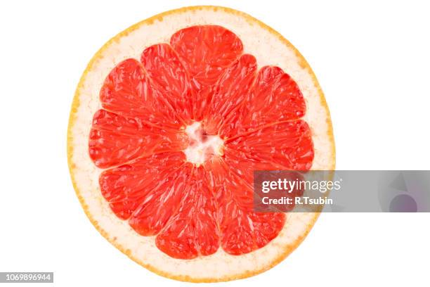 close up image of sliced red grapefruit - grapefruit stock pictures, royalty-free photos & images