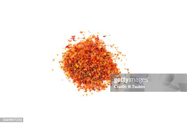 crushed red chili pepper - chilli powder stock-fotos und bilder