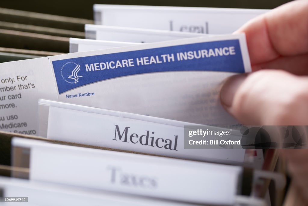 Insurance File Folder Examples Medicare Health Insurance Card In File Folder High-Res Stock Photo ...