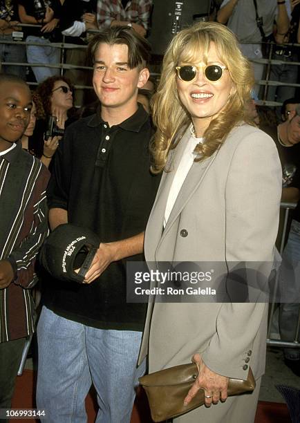 Faye Dunaway and son Liam O'Neill during "Batman Forever" Los Angeles Premiere at Mann's Village Theater in Westwood, California, United States.