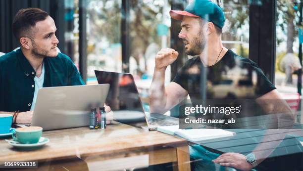 meeting in a café. - new zealand small business stock pictures, royalty-free photos & images