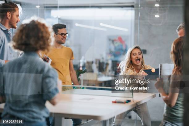 college students having fun while playing table tennis at campus. - friends table tennis stock pictures, royalty-free photos & images