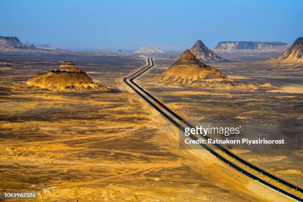 black desert hills in egypt - aswan stockfoto's en -beelden