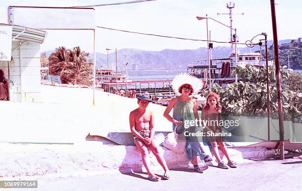 vintage family on summer vacations. - fashion swimwear stock pictures, royalty-free photos & images