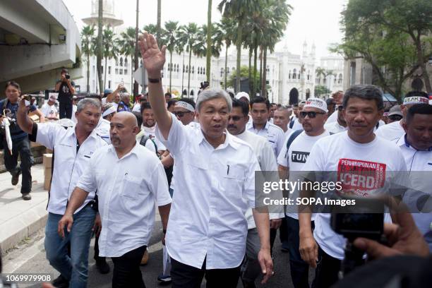 President Ahmad Zahid Hamidi seen waving to his supporters in front of the National Mosque during the Anti-ICERD 812 Rally. Thousands of supporters...