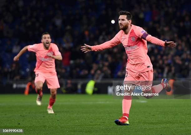 Lionel Messi of Barcelona celebrates after scoring his team's first goal during the La Liga match between RCD Espanyol and FC Barcelona at RCDE...