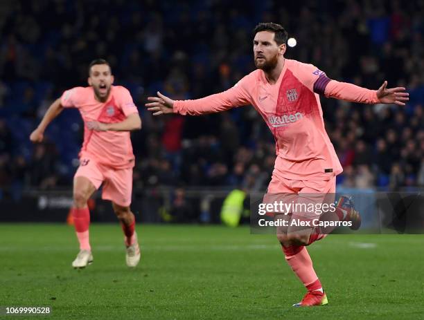 Lionel Messi of Barcelona celebrates after scoring his team's first goal during the La Liga match between RCD Espanyol and FC Barcelona at RCDE...