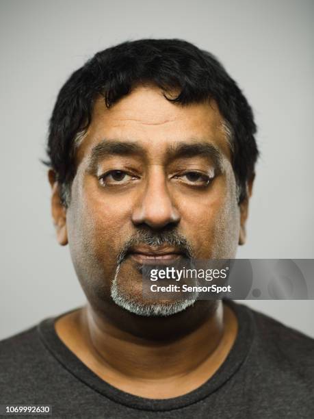 real indian man with blank expression - mug shot stock pictures, royalty-free photos & images