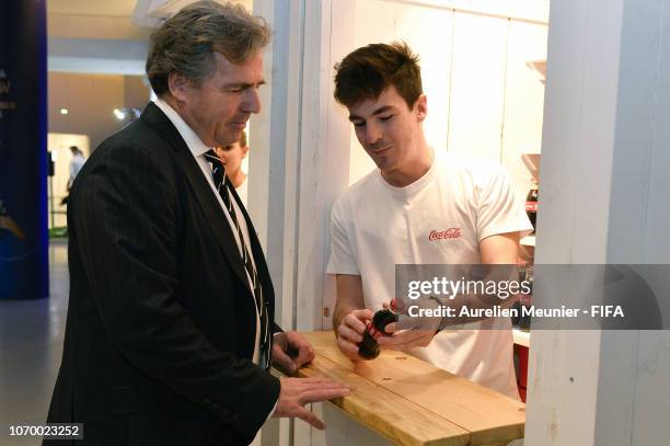 Chief commercial officer Philippe Le Floc'h visits the Coca Cola stand before the final draw for the FIFA Women's World Cup 2019 at "La Seine...