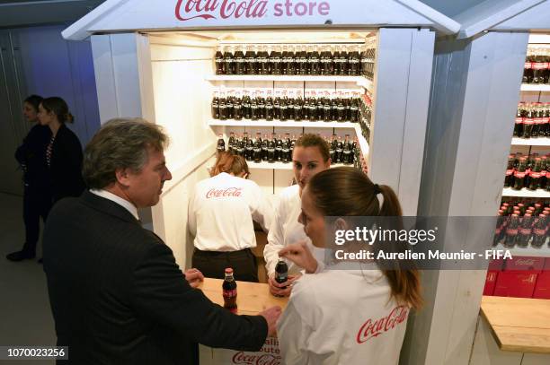 Chief commercial officer Philippe Le Floc'h visits the Coca Cola stand before the final draw for the FIFA Women's World Cup 2019 at "La Seine...