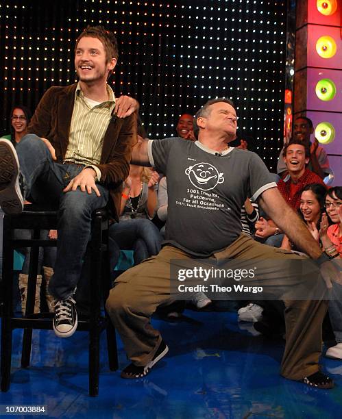 Elijah Wood and Robin Williams during Robin Williams, Elijah Wood, Snoop Dogg and Panic! at the Disco Visit MTVs TRL Gaming Week 2.0 at MTV Studios...