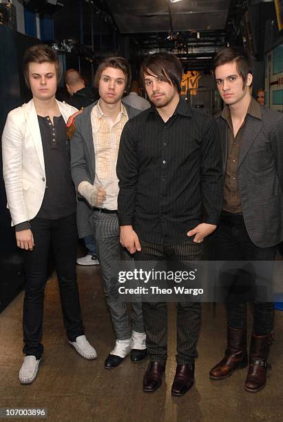 Spencer Smith , Ryan Ross , Jon Walker , and Brendon Urie , of Panic! At the Disco