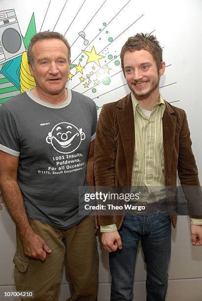 Robin Williams and Elijah Wood during Robin Williams, Elijah Wood, Snoop Dogg and Panic! at the Disco Visit MTVs TRL Gaming Week 2.0 at MTV Studios...