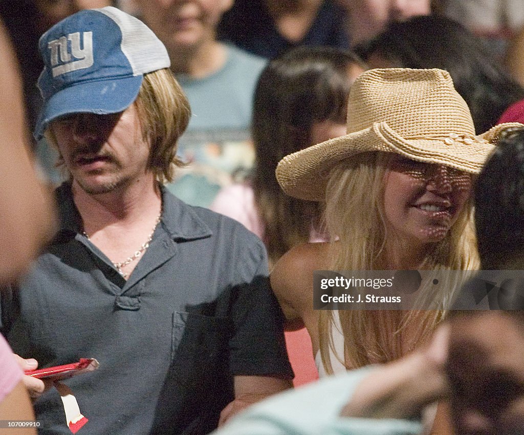 David Spade and Heather Locklear during David Spade and Heather... News