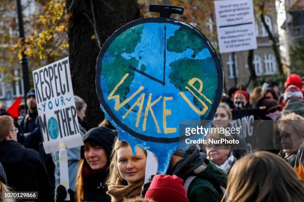 Activists from around the world walk on the streets of Katowice during the March for Climate on December 8, 2018 in Katowice, Poland. The march was...