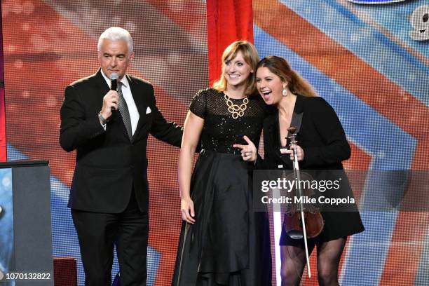 Actor/Comedian John O’Hurley, competitive swimmers Katie Ledecky, and Elizabeth Beisel speak on stage at the 2018 Golden Goggle Awards on November...