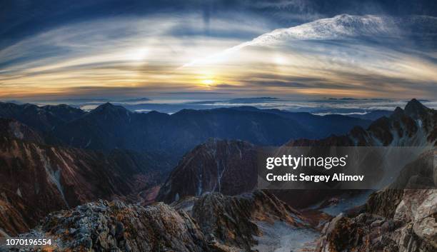 optical phenomenon of halo over highland valley in japan - optical phenomenon halo stock pictures, royalty-free photos & images