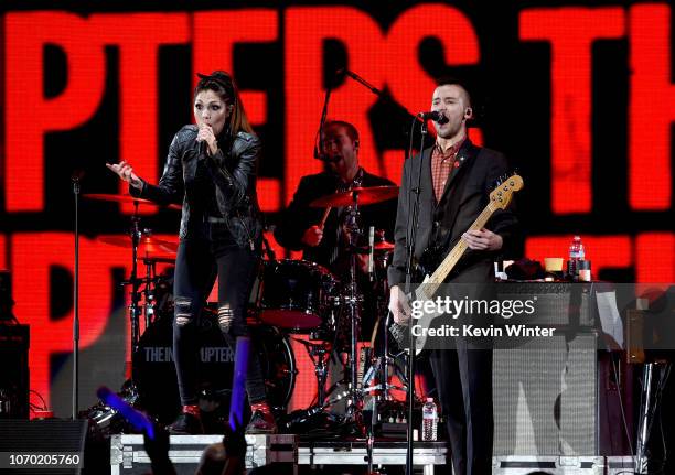 Aimee Allen, Jesse Bivona and Justin Bivona of the band The Interrupters perform on stage during the KROQ Absolut Almost Acoustic Christmas at The...
