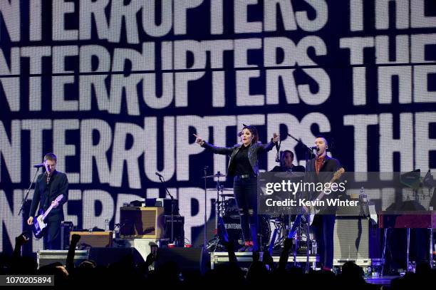 Kevin Bivona, Aimee Allen, Jesse Bivona and Justin Bivona of the band The Interrupters perform on stage during the KROQ Absolut Almost Acoustic...