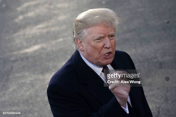 President Donald Trump speaks to members of the media prior to his departure from the White House November 20, 2018 in Washington, DC. President...
