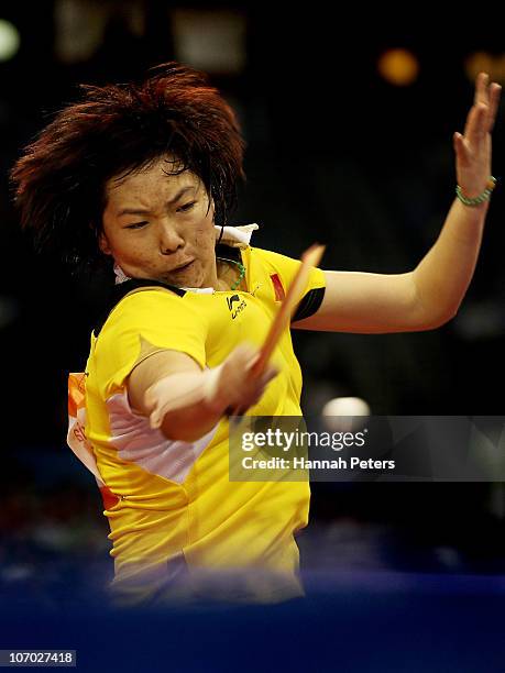 Xiaoxia Li of China competes against Kung Ah Kim of South Korea in the Table Tennis Women's Singles Semifinals at Guangzhou Gymnasium during day...