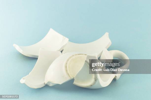 white broken cup - broken vase stock pictures, royalty-free photos & images