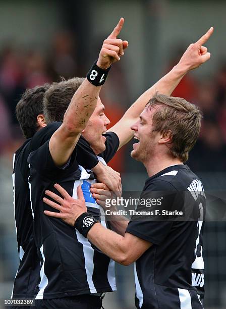 Christian Haas and Martin Dausch of Aalen celebrate their teams second goal during the Third League match between Rot Weiss Ahlen and VfR Ahlen at...