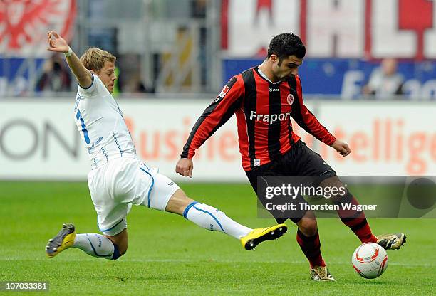Georgios Tzavellas of Frankfurt battles for the ball with Boris Vukcevic of Hoffenheim during the Bundesliga match between Eintracht Frankfurt and...
