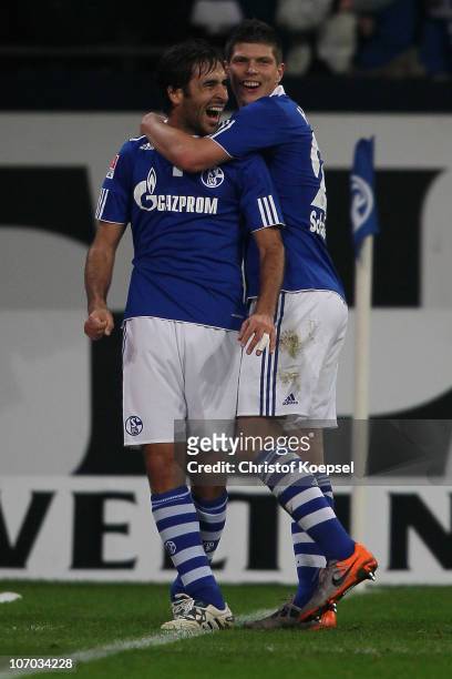 Raúl Gonzalez of Schalke celebrates his third goal with Klaas-Jan Huntelaar of Schalke during the Bundesliga match between FC Schalke 04 and SV...