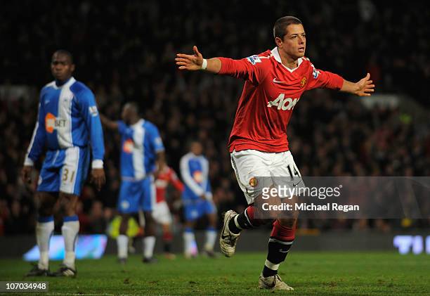 Javier Hernandez of Manchester United celebrates scoring his team's 2-0 goal during the Barclays Premier League match between Manchester United and...