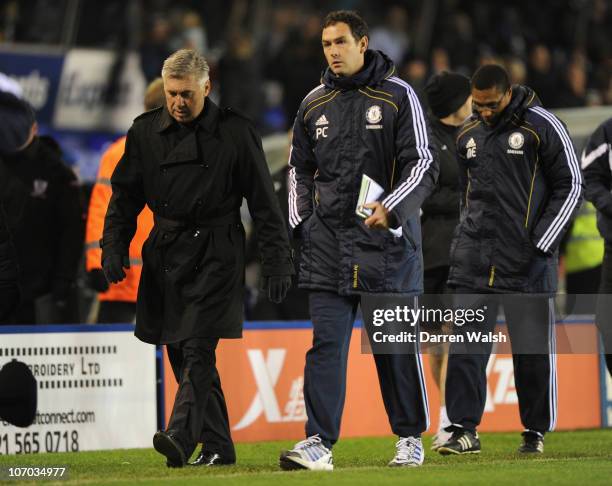 Chelsea manager Carlo Ancelotti with assistant coaches Paul Clement and Michael Emenalo after defeat in the Barclays Premier League match between...