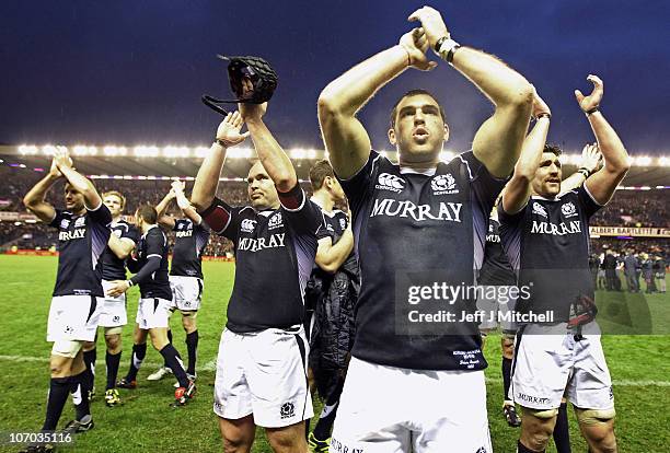Dougie Hall, Sean Lamont and Kelly Brown of Scotland celebrate victory over South Africa in the international match between South Africa and Scotland...