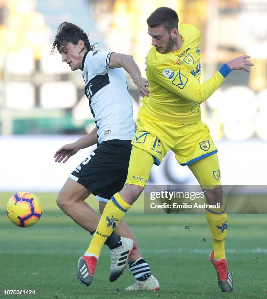 Roberto Inglese of Parma Calcio competes for the ball with Mattia Bani of Chievo Verona during the Serie A match between Parma Calcio and Chievo...
