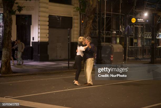 Couple dance tango during the Great National Milonga 2018 in the Avenida de Mayo Avenue, in Buenos Aires, Argentina, Saturday, Dec.8, 2018. Thousands...