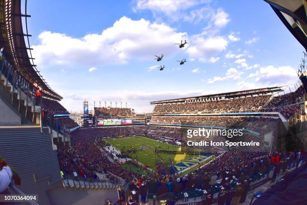 Apache helicopters fly over the stadium during the Army-Navy game on December 8 at Lincoln Financial Field in Philadelphia,PA.
