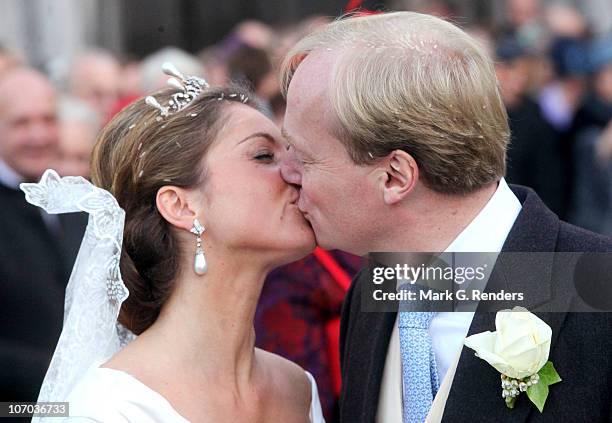 Princess Annemarie Gualtherie van Weezel and Prince Carlos de Bourbon de Parme kiss during their Royal wedding at Abbaye de la Cambre on November 20,...